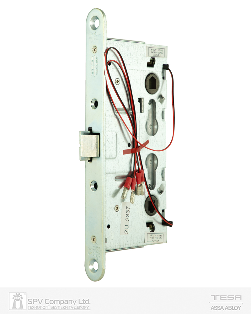 Фото Замок електромеханічний TESA CF6STRSR9ZCEROB BS65мм 72мм FP24 ZCE UNIV DIN SOL 12-24V NC PANIC_FUNCTION EI   відкривання назовні в інтернет-магазині lock.ua